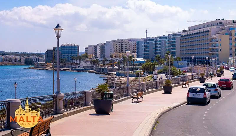 Part of the Qawra seafront with several hotels, lidos and restaurants by the sea..