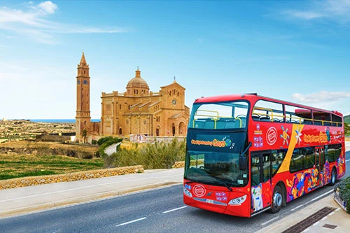 Tour Gozo on a sightseeing hop-on/hop-off bus.