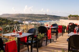 View of Mellieħa from the terrace at One80 Kitchen and Lounge.