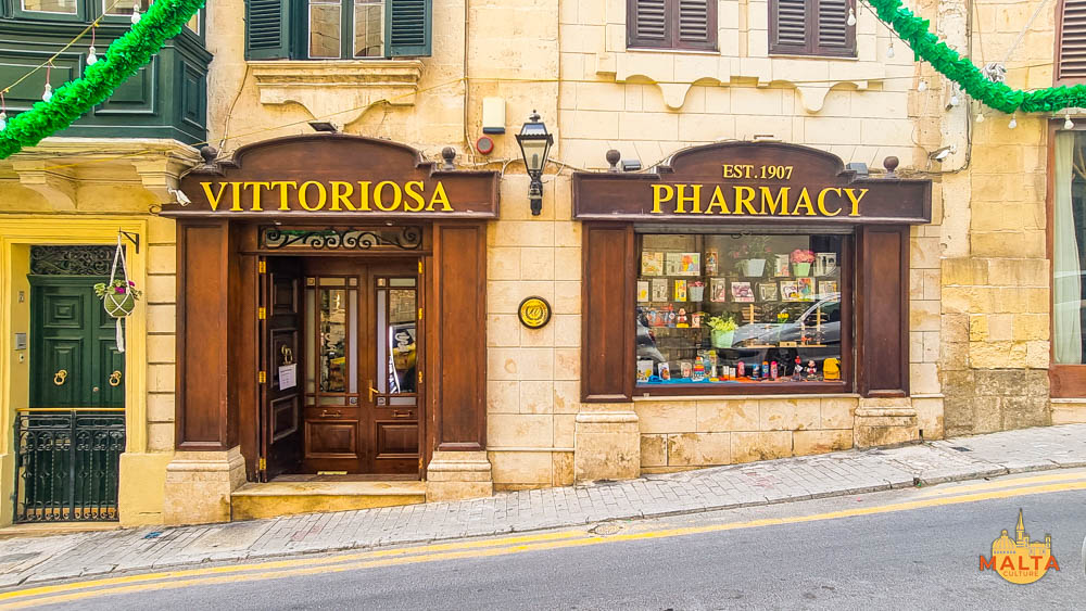 A charming shopfront of an old pharmacy in Birgu.