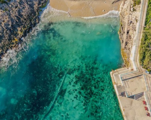 The stunning hues of Ħondoq ir-Rummien Bay in Gozo.